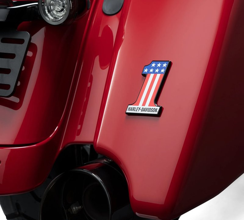Harley-Davidson Accessories Display a touch of attitude with the #1 Decorative Medallion. Ideal for application on a plate-style sissy bar upright, derby cover, timer cover, Tour-Pak luggage carrier or saddlebag, glove box or chrome battery cover. It also looks great on a tool box or tailgate. The quality adhesive backing on this premium zinc die cast medallion allows for easy and secure installation on most flat surfaces. Self-adhesive and easy to install. Size: 3" x 2".