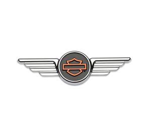 Harley-Davidson Accessories Display a touch of attitude with the Chrome Winged Bar & Shield Decorative Medallion. Ideal for application on a plate-style sissy bar upright, derby cover, timer cover, Tour-Pak luggage carrier or saddlebag, glove box or chrome battery cover. It also looks great on a tool box or tailgate. The quality adhesive backing on this premium zinc die cast medallion allows for easy and secure installation on most flat surfaces. Brilliant chrome wings flank a centred black and orange Bar & Shield logo. Measures 4-7/8" x 1-1/2". Self-adhesive and easy to install.