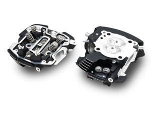 Harley-Davidson Accessories This Center-Cooled generation of Extreme Ported Cylinder Heads has been meticulously designed to help optimize air/fuel flow and velocity. Building on the previous Oil/Twin-Cooled generation of CNC-Ported Milwaukee-Eight Cylinder Heads, the Screamin' Eagle team refined the intake and exhaust ports based on extensive racing efforts to help maximize the flow of high-velocity air through 2mm larger (42mm intake/34mm exhaust) valves than the Original Equipment heads and fully machined the combustion chamber to help optimize combustion efficiency. Due to the new race-inspired intake port geometry, these heads require the use of either the Screamin' Eagle High-Flow 68MM Intake Manifold (P/N 27300218) or the Screamin' Eagle Extreme Flow 68MM CNC Ported Intake Manifold (P/N 27300217). Factory equipped with high-performance valve springs that remain stable with high-lift cams and in high-RPM operation. Race-only.