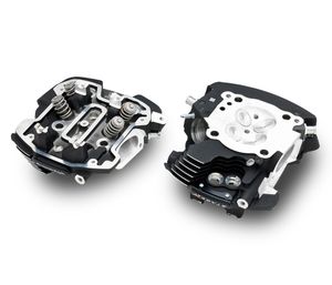Harley-Davidson Accessories This Center-Cooled generation of Extreme Ported Cylinder Heads has been meticulously designed to optimize air/fuel flow and velocity. Building on the previous Oil/Twin-Cooled generation of CNC-Ported Milwaukee-Eight Cylinder Heads, the Screamin' Eagle team refined the intake and exhaust ports based on extensive racing experience to maximize the flow of high-velocity air through 2mm larger (42mm intake/34mm exhaust) valves than the Original Equipment heads, and fully machined the combustion chamber to optimize combustion efficiency. Due to the new race-inspired intake port geometry, these cylinder heads require the use of either the Screamin' Eagle High-Flow 68mm Intake Manifold (P/N 27300218) or the Screamin' Eagle Extreme Flow 68mm CNC Ported Intake Manifold (P/N 27300217). Factory equipped with high-performance valve springs that remain stable with high-lift cams and in high-RPM operation. For race use only.