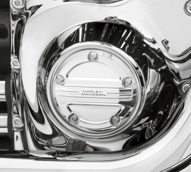 Harley-Davidson Accessories Airflow Timer Cover. Shaped to cheat the wind, the Airflow Collection features a raised bridge with 3 laminar grooves that float over the recessed panels. Polished and mirror-chromed layered surfaces capture light, while shadows frame the subtle black-filled Harley-Davidson signature, setting the stage for your one-of-a-kind custom ride. Includes chrome-plated mounting hardware.