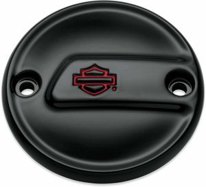 Harley-Davidson Accessories Kahuna Timer Cover in gloss black. The Harley-Davidson Kahuna Collection's rich, gloss black surface is interrupted by a powerful raised bridge that draws the eye from leading to trailing edge. Gloss black finish with a red Bar & Shield logo. Includes black zinc mounting hardware.