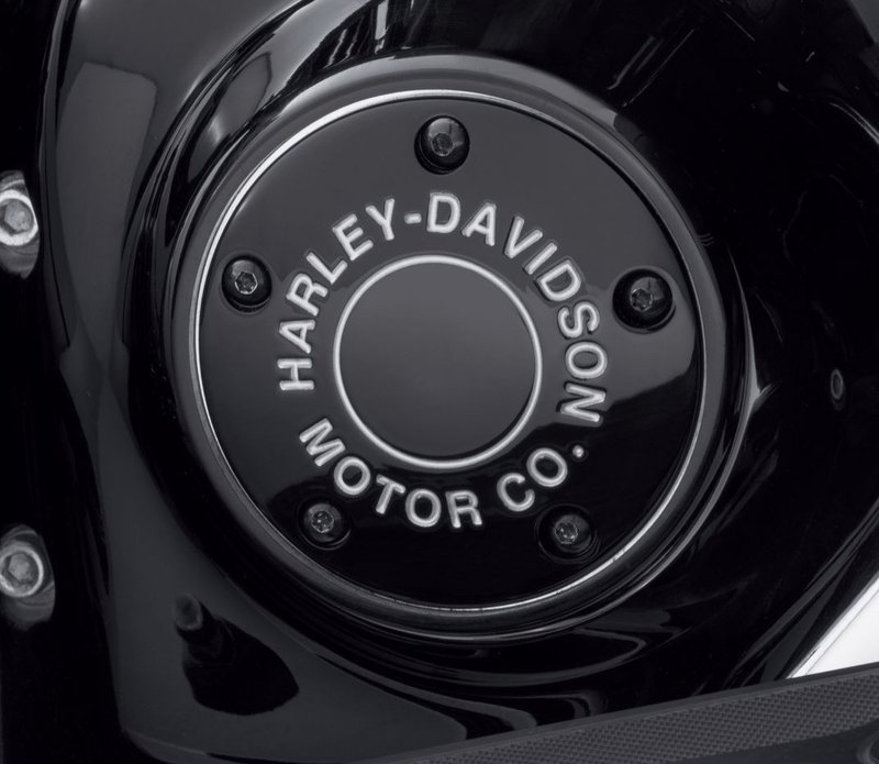 Harley-Davidson Accessories H-D Motor Co. Timer Cover in black. An aggressive twist on a classic style. The Harley-Davidson® Motor Co. Collection personifies Harley® style and features a rich gloss black surface, trimmed with deep-cut silver-filled lettering that surrounds a central groove. The clean design and luxurious finish are the perfect match for blacked-out engines. Includes black zinc hardware and is easy to install.