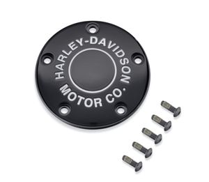 Harley-Davidson Accessories H-D Motor Co. Timer Cover in black. An aggressive twist on a classic style. The Harley-Davidson® Motor Co. Collection personifies Harley® style and features a rich gloss black surface, trimmed with deep-cut silver-filled lettering that surrounds a central groove. The clean design and luxurious finish are the perfect match for blacked-out engines. Includes black zinc hardware and is easy to install.