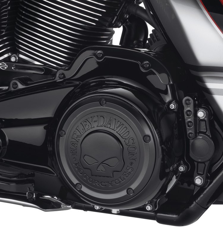 Harley-Davidson Accessories Willie G Skull Derby Cover in black. Penned at the hand of Willie G®, the famous Skull Collection makes a shift to the dark side. Completely drenched in black, the raised skull and surrounding Harley-Davidson® Motorcycle script add a subtle ominous touch to your ride. The matte finish easily coexists alongside gloss black or wrinkle black surfaces. Includes matching black hardware. Complete the look with additional accessories from the Harley-Davidson Willie G Skull Collection.