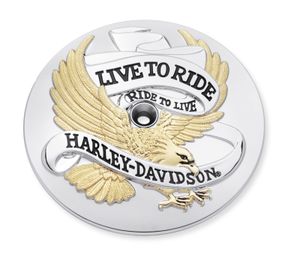 Harley-Davidson Accessories Live To Ride Air Cleaner Trim in gold. "Live To Ride, Ride to Live." It has become the motto of the Harley-Davidson nation, accompanying riders over millions of miles of travel. This collection is a tribute to that way of life.