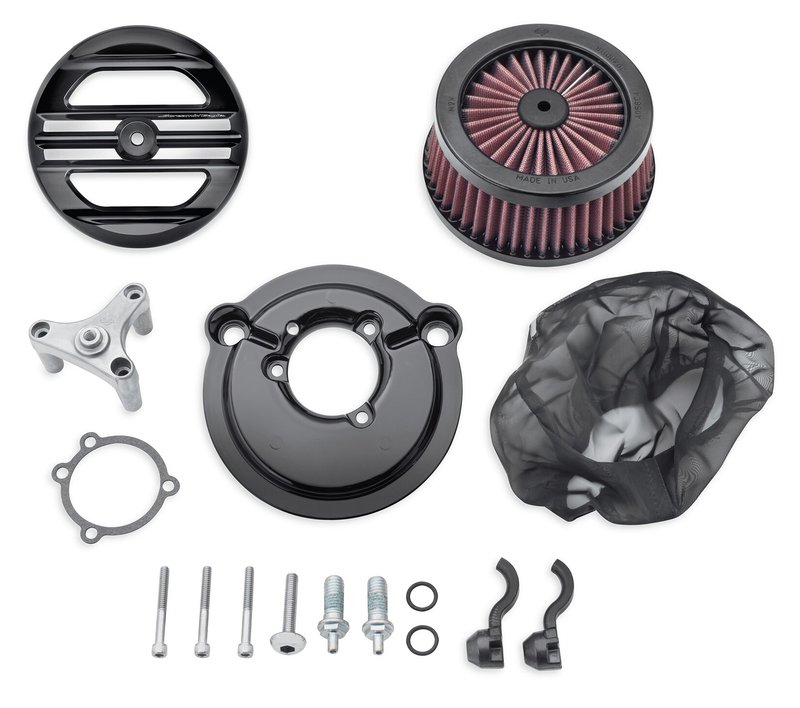 Harley-Davidson Accessories The look is bold and the performance exhilarating. This race-inspired air cleaner is engineered to flow through the perimeter and the face of the air filter, providing high volumes of unrestricted airflow to the engine. The open-design face plate features a rich black finish with machined longitudinal strakes to expose the glowing aluminum below. Includes air cleaner trim, one-piece cast back plate, high-flow washable air filter element, rain sock and all required hardware. Gloss Black finish.