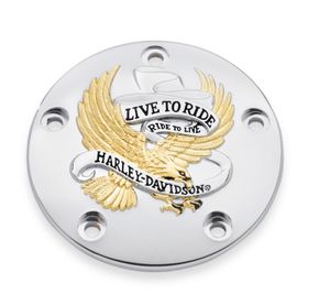 Harley-Davidson Accessories Live To Ride Timer Cover in gold. "Live To Ride, Ride to Live." It has become the motto of the Harley-Davidson nation, accompanying riders over millions of miles of travel. This collection is a tribute to that way of life. Includes chrome-plated stainless steel mounting hardware.
