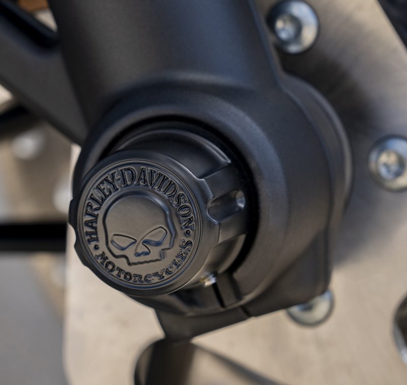 Harley-Davidson Accessories Show what you've got with these Harley-Davidson Skull axle caps. The look from the skull's black eye sockets is unmistakable. Black finish. Sold in pairs.
