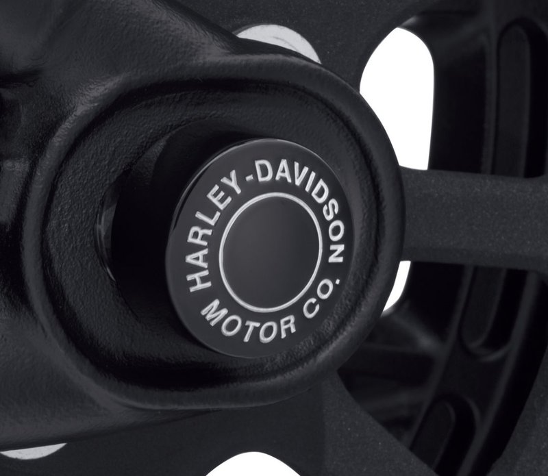 Harley-Davidson Accessories Cover the rear axle in style. Drenched in gloss black and trimmed with deep-cut, silver-filled Harley-Davidson® Motor Co. lettering, these Rear Axle Nut Covers are an aggressive twist on a classic style. Gloss black finish. The perfect finishing touch to complete a blacked-out rear end. Includes set screws and Allen wrench for easy installation. Sold in pairs.