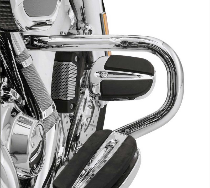 Harley-Davidson Accessories Create a sleek, slammed look on your custom bagger with the Chopped Engine Guard. This guard offers a slim, low-profile design that retains function while delivering a unique styling twist. - Chrome finish - Upper mounts connect midway up the downtube, 11" lower than the stock guard - The minimalistic look reduces the visual mass of the bike, while the mounting point lowers the bike's visual centre of gravity by 1.25" - The engine guard features a slightly forward sweep that provides plenty of room around the brake and shift levers - Easy to install