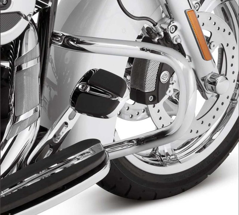 Harley-Davidson Accessories Create a sleek, slammed look on your custom bagger with the Chopped Engine Guard. This guard offers a slim, low-profile design that retains function while delivering a unique styling twist. - Chrome finish - Upper mounts connect midway up the downtube, 11" lower than the stock guard - The minimalistic look reduces the visual mass of the bike, while the mounting point lowers the bike's visual centre of gravity by 1.25" - The engine guard features a slightly forward sweep that provides plenty of room around the brake and shift levers - Easy to install