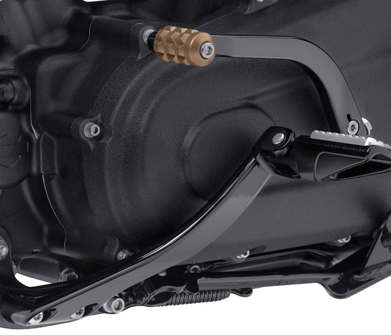 Harley-Davidson Accessories The Original Equipment Mid-Controls (left shift side) move foot pegs and controls from a forward to mid location on the motorcycle, putting you in a better position for aggressive riding. This mid-control option is a perfect solution for performance-oriented Softail customization and will not compromise vehicle function or handling.