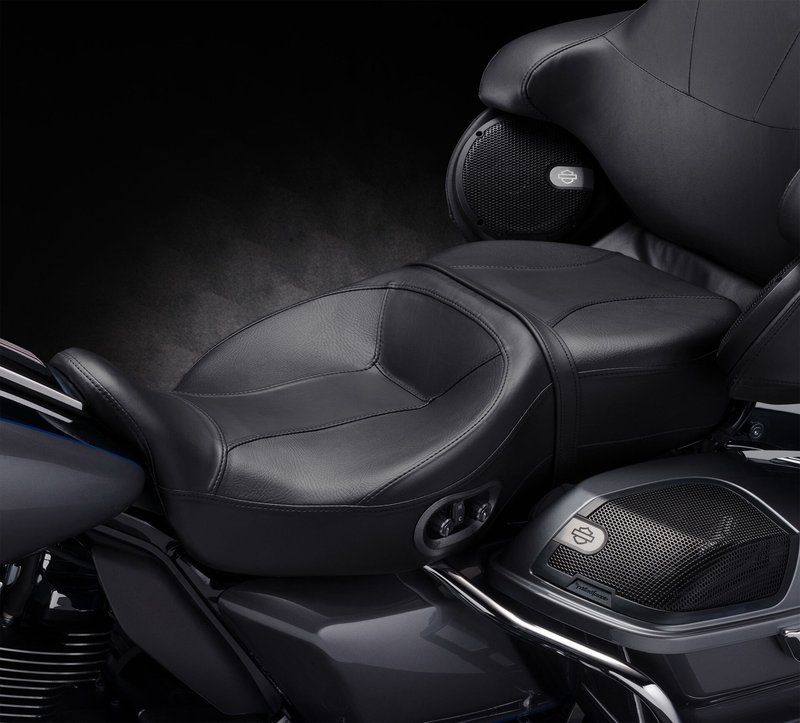 Harley-Davidson Accessories Extend and optimise your riding season thanks to the cooling and heating technology built into this premium seat for Touring and Trike models. The electronic heating/cooling system is self-contained within the seat, which can be easily removed after unplugging a single cord. It offers industry-leading cooling performance, and the heating function reaches its selected temperature twice as fast as previous heated seats. The Hammock seat is the most premium touring seat design, created for the rider who wants the ultimate in long-haul comfort. It features a sling-like fabric suspension system that acts like a hammock, providing two inches of suspension above the seat pan, topped with an additional two inches of traditional foam cushioning. This internal suspension prevents bottoming out and improves comfort and endurance by isolating the rider from harsh road conditions. The passenger position features a multiple spring-board style suspension system along with two inches of traditional foam. - In testing with a baseline ambient temperature of 85 degrees, the seat cover cools down by 25 degrees in about 30 minutes, from a 98-degree body temperature to about 76 degrees - As you ride, the cooling function draws heat away from your body to make you feel cooler - Dual-zone control: rider and passenger positions must use the same temperature mode (heat or cool), but each can adjust the level to individual preference or switch the function off - The redesigned heating element reaches the selected temperature in only seven minutes - Seam-sealed construction prevents rain or wash water from infiltrating the seat foam - Compatible with the Rider Backrest Mounting Kit (P/N 52589-09A for Touring models and P/N 52300642 for Tri Glide models)