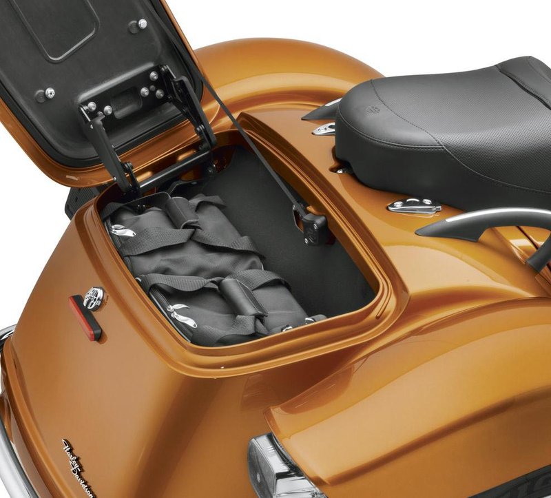 Harley-Davidson Accessories Trunk Travel-Paks. These well-constructed ballistic nylon bags are designed to fit perfectly into the rear or top-load trunk of the Trike models. Styled to complement the Premium Luggage Collection, the twin bags feature white piping and a reflective Bar & Shield logo, glove-friendly zippered access to the main compartment, and convenient outer pouches. Comfortable carrying straps make transport easy. Sold in pairs. Fits '09-later Trike models.