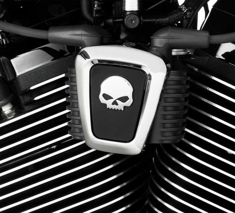 Harley-Davidson Accessories Willie G Skull Coil Cover in chrome. Display a touch of attitude with the Willie G Skull Collection. This coil cover makes it easy to complete the custom look. Durable die-cast aluminium with an electroformed insert that adds an edgy detail and hides the coil. Easy to install with included mounting hardware. Styled to complement other menacing Willie G Skull accessory items.