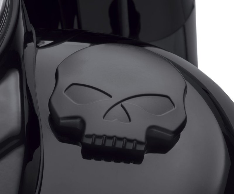 Harley-Davidson Accessories Penned by the hand of Willie G, the famous Skull Collection makes a shift to the dark side. Completely drenched in black, the raised skull and surrounding Harley-Davidson Motorcycle script add a subtle, ominous touch to your ride. Black finish. The matte finish easily coexists alongside gloss black or wrinkle black surfaces. A ratcheting design ensures the design faces the correct direction, and the shape is easy to grip, even while wearing gloves. Easy to install. Complete the custom look of your bike with additional accessories from the Harley-Davidson Willie G Skull Collection.