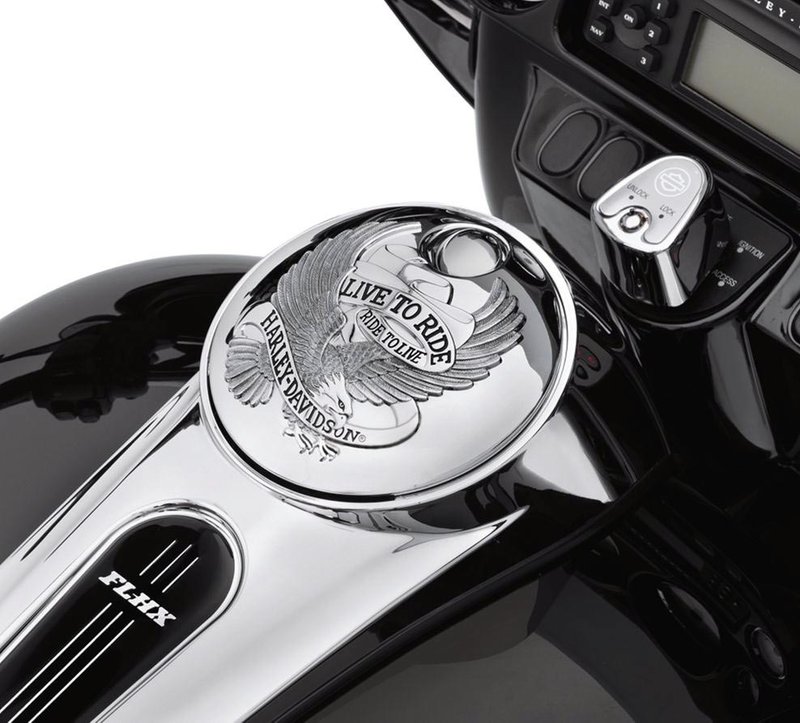 Harley-Davidson Accessories "Live to Ride, Ride to Live." It has become the motto of the Harley-Davidson nation, accompanying riders over millions of miles of travel, and this collection is a tribute to that way of life. This easy-to-install fuel door replaces the stock door and reuses the original equipment mounting hardware and lock. Chrome finish.
