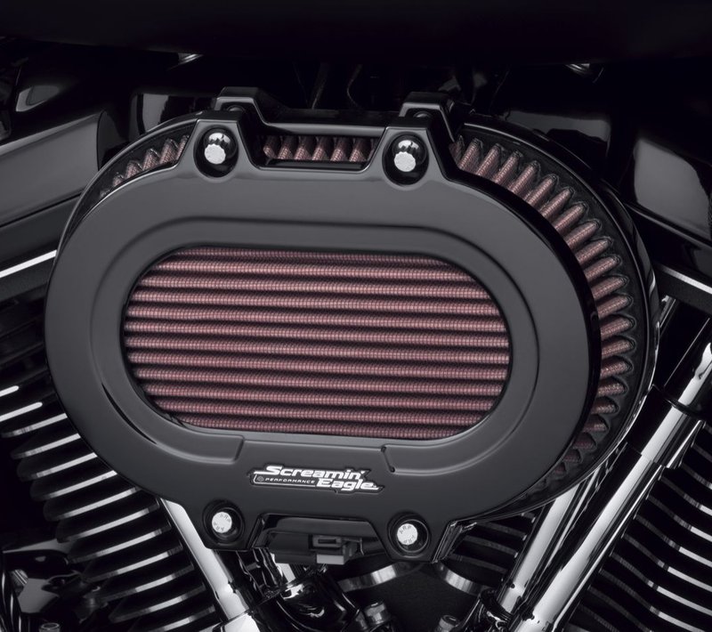 Harley-Davidson Accessories The Ventilator Extreme Air Cleaner Cover trims the face of the Screamin' Eagle Extreme Ventilator filter in style and features aggressive mounting lugs, polished stainless steel custom ARP fasteners and an inset Screamin' Eagle medallion. Gloss Black finish. Made from cast aluminum. Wraps the leading edge of the filter element, covering the rubber gasket without restricting air flow. Required to complete installation of the Ventilator Extreme Air Cleaner Kit (P/N 29400396 & 29400397). Includes necessary ARP hardware.