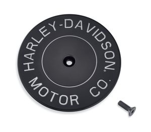 Harley-Davidson Accessories H-D Motor Co. Air Cleaner Trim in black. An aggressive twist on a classic style. The Harley-Davidson® Motor Co. Collection personifies Harley® style and features a rich gloss black surface, trimmed with deep-cut silver-filled lettering that surrounds a central groove. The clean design and luxurious finish are the perfect match for blacked-out engines. Includes black zinc hardware and is easy to install.