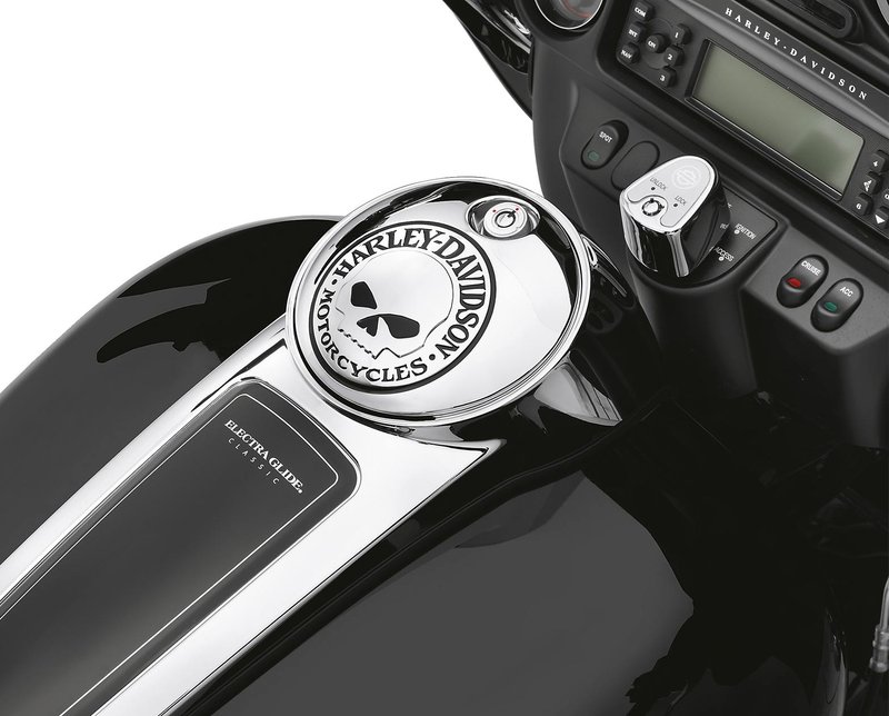 Harley-Davidson Accessories Add a little attitude to your ride. Styled to complement Harley-Davidson Skull accessory items, the menacing raised skull with black-filled eyes leaps from a field of chrome, while the surrounding "Harley-Davidson Motorcycles" script is the perfect finishing touch. This easy-to-install fuel door replaces the stock door and reuses the original equipment mounting hardware and lock. Complete the custom look of your bike with additional accessories from the Harley-Davidson Willie G Skull Collection.
