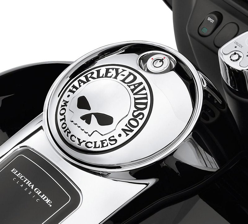 Harley-Davidson Accessories Add a little attitude to your ride. The menacing raised skull with black-filled eyes leaps from a field of chrome, and the surrounding "Harley-Davidson Motorcycles" script is the perfect finishing touch. These easy-to-install fuel doors replace the stock door and reuse the Original Equipment mounting hardware and lock. Complete the custom look of your bike with additional accessories from the Harley-Davidson Willie G Skull Collection.