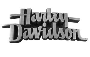Harley-Davidson Accessories Harley-Davidson Tank Medallion, right. For Vivid Black, Black Denim, Charcoal Pearl and Voodoo Purple Flake tanks.
