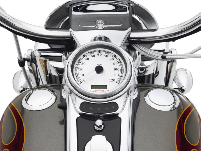 Harley-Davidson Accessories Emphasise the long, lean look of the fuel tank with this original Harley-Davidson flush mount fuel cap. This flush mount fuel cap and gauge kit offers a pop-up filler design that, when installed and sealed, looks identical to the flush gauge; a simple push and the filler cap pops up to provide ample grip, even while wearing gloves. The flush fuel gauge features individual LED lamps that shine through a mirror-coated glass which glows when the ignition is switched on. A photocell automatically adjusts LED brightness for improved visibility in direct sunlight, and dims at night to avoid distraction. The complete kit includes a fuel cap, fuel gauge, trim ring and plug-in wiring harness. Chrome finish.