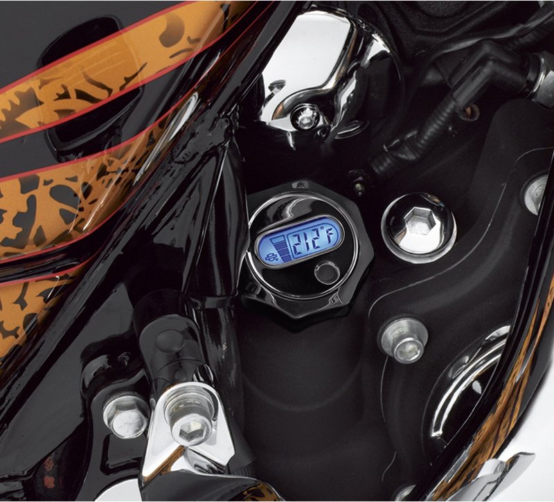 Harley-Davidson Accessories Oil Level and Temperature Dipstick with Lighted LCD Readout in gloss black. New and improved "capacitive" level sensing technology provides the highest degree of accuracy and durability. These dipsticks let you check your oil level and temperature with the push of a button, lighting up with a brilliant backlight - no more grabbing a rag to pull your hot dipstick and no more oil drips on your pipes or garage floor. Oil level is indicated by a four-segment readout that even reminds you to check your oil when it is hot. Designed to be waterproof, the LCD readout operates on a long-lasting, replaceable lithium coin-type battery (CR2032 3V) and features a low battery indicator and a press-and-hold feature to toggle between Fahrenheit and Celsius. Gloss black finish.
