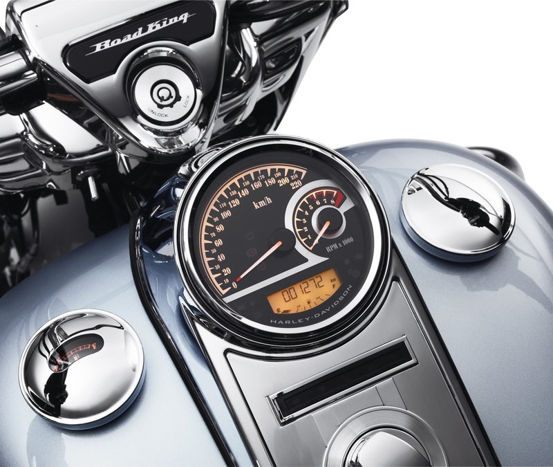 Harley-Davidson Accessories Maintain the clean view over the handlebar. This unique combination Speedometer/Analogue Tachometer lets you monitor engine speed, fixed-segment fuel level and gear indication without adding extra handlebar-mounted gauges. - Mounts in the stock dash opening as a direct plug-in installation - Speedometer and tachometer pointers sweep clockwise to provide a "gauge within a gauge" look - Backlit gauges include a large LCD information screen displaying odometer/tripmeter data, miles-to-empty readings, an easy-to-read segmented fuel display, and a gear position indicator - Push-button adjustable backlighting with over 600 colour-tone options, allowing the rider to match pointer, LCD and backlighting colours to any paint scheme or viewing preference - Includes a data transfer cable to easily upload initial mileage at the time of installation
