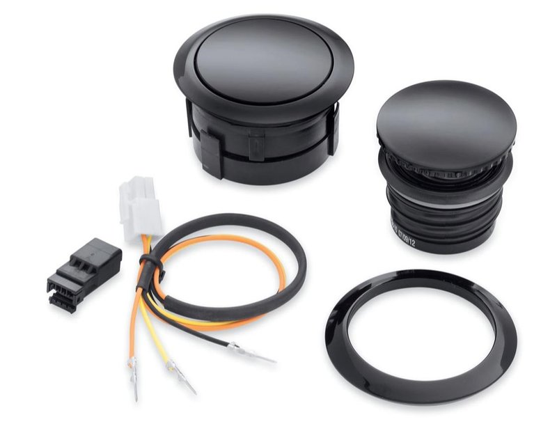 Harley-Davidson Accessories Emphasise the long, lean look of the fuel tank with this original Harley-Davidson flush mount fuel cap kit. This flush mount fuel cap and gauge kit offers a pop-up filler design that, when installed and sealed, looks identical to the flush gauge; a simple push and the filler cap pops up to provide ample grip, even while wearing gloves. The flush fuel gauge features individual LED lamps that shine through a mirror-coated glass which glows when the ignition is switched on. A photocell automatically adjusts LED brightness for improved visibility in direct sunlight, and dims at night to avoid distraction. The complete kit includes a fuel cap, fuel gauge, trim ring and plug-in wiring harness. Gloss black finish.