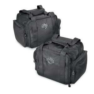 Trunk Travel-Paks. These well-constructed ballistic nylon bags are designed to fit perfectly into the trunk of the Trike model. Styled with a reflective Bar & Shield logo, they feature zippered outer pouches and a mesh inner storage pocket for packing convenience, and comfortable carrying straps make transport easy. Sold in pairs. Fits '09-later Trike models.