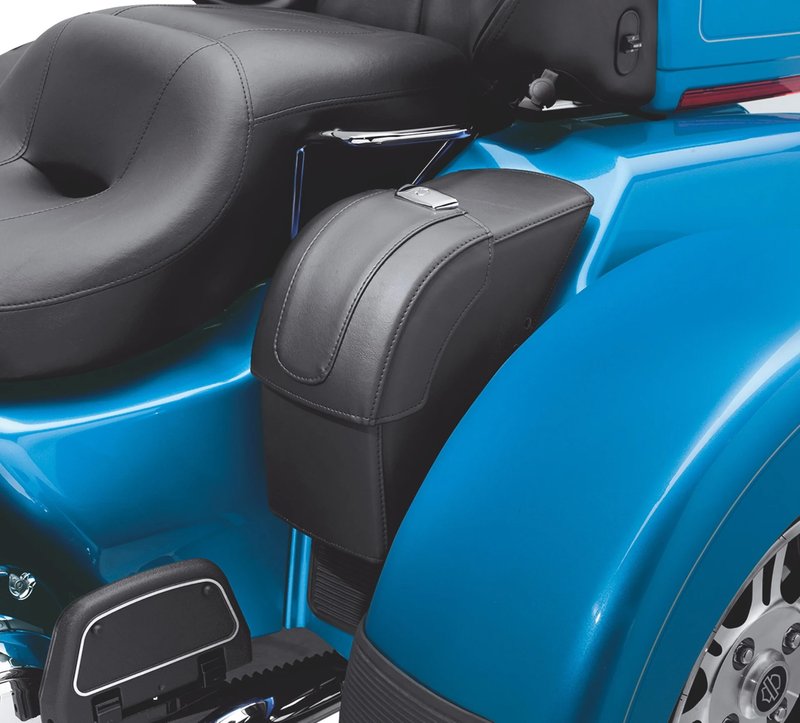 Harley-Davidson Accessories Saddlebags, 11.5 Litre. Add storage within easy reach. These vinyl-wrapped rigid side bags are a perfect match for either Original Equipment or accessory seats and are contoured to fit comfortably under the passenger's legs. The forward-opening bags feature an easy-grip chrome-plated Bar & Shield finger pull and snap shut with a strong magnetic closure. The interior holds two soda cans or water bottles side by side and is ideal for sunscreen, glasses and your phone. Total luggage capacity: 700 cubic inches. Fits '09-later Trike models.