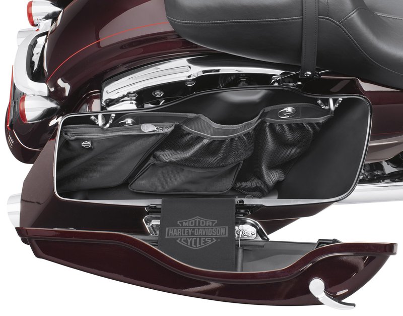 Harley-Davidson Accessories Saddlebag Wall Organizer. This convenient storage system equips the interior wall of your colour-matched saddlebags for easy access to keys, phones, maps and gloves. The organiser features a combination of mesh and enclosed pouches and pockets sized for safe, rattle-free packing. Fits '14-later Touring models equipped with colour-matched hard saddlebags.