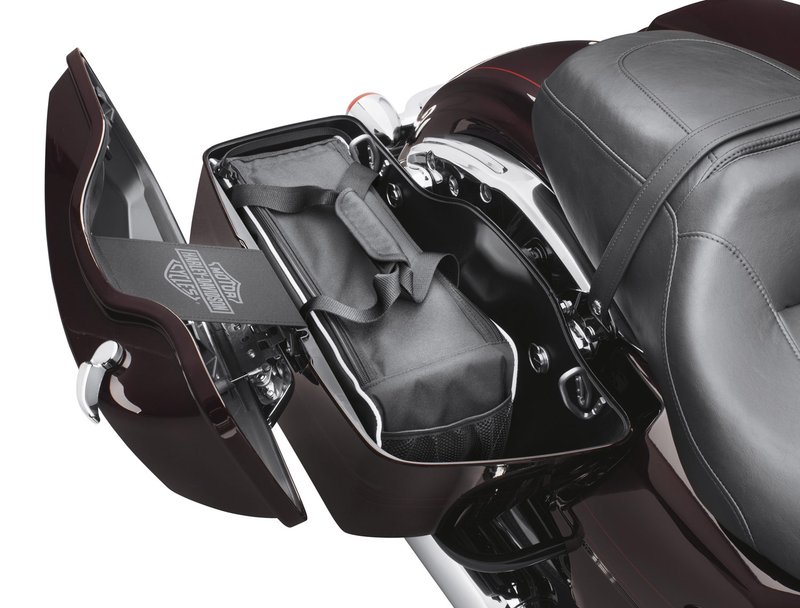 Harley-Davidson Accessories Saddlebag Cooler. Keep beverages and snacks cold right in your saddlebag on hot summer rides. This zippered bag is fully lined and insulated and fits the full length of your saddlebag. Fits '93-later Touring models equipped with colour-matched hard saddlebags.
