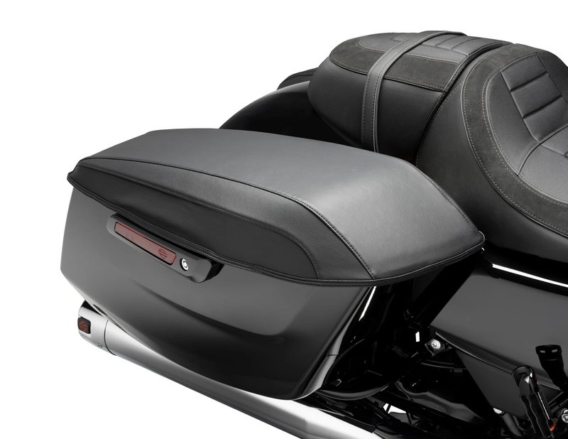 Harley-Davidson Accessories Saddlebag Lid Bra. Protect your saddlebags from boot scuffs, stone chips and road debris. These custom-fit Saddlebag Lid Bras are made from non-abrasive, fleece-backed vinyl, with a new and improved hook-and-loop tab design for easy fitting and removal. The sleek design integrates onto your saddlebag and enhances the look of the bike, and features small Bar & Shield logos stitched into the material. The kit includes left and right side lid bras. Fits Street Glide and Road Glide '24-later models.
