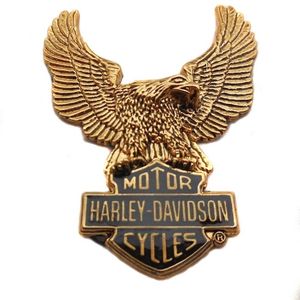 Harley-Davidson Accessories Works great on derby covers, timer covers, medallion plate-style sissy bar uprights and chrome battery covers. Large medallion featuring the Eagle with Bar & Shield logo. Size: 91 x 73 mm (3.6" x 2.9").