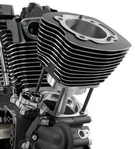 Harley-Davidson Accessories When it comes to increasing engine power, there is no substitute for more cubic inches. With efficient filling of the air/fuel mixture, the bigger the displacement, the more power your engine can produce. In the past, the only way to increase the bore of your 96 or 103 cubic inch Twin Cam V-Twin motor was to tear down the motor and re-bore the engine cases to fit larger bore cylinder spigots. It was a labor-intensive and expensive process. Now, you can take your 96 or 103 cubic inch motor to a full 110 cubic inches without removing the engine from the chassis. The Screamin' Eagle team has engineered a 4" Big Bore Cylinder and Piston package that increase the internal bore from 3-7/8" to 4", without increasing the outside diameter of the cylinder spigot. The cylinder slips into the existing case bore without modification. This kit will add a whopping 7 cubic inches of displacement for more torque throughout the RPM range. The kit includes front and rear cylinders, system-matched pistons with rings and breathers.