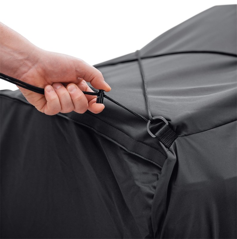 Harley-Davidson Accessories Pamper your bike. This luxuriously soft microfiber cover is ideal for short and long term indoor storage. - The breathable microfiber material promotes air circulation to reduce moisture build-up and minimize corrosion - Cover skirt features front and rear adjustable drawstrings to cinch the cover around the bike, and a convenient belly strap to reduce ballooning in the wind - The corset-style cinching system along the backbone lets you adjust the cover for best fit on a variety of models - The cover features heat-resistant panels that protect the material from warm exhaust, and the hook-and-loop opening at the rear of Touring covers accommodates antennas - The two-tone orange and black cover features reflective piping for added visibility, and an integrated storage pouch for convenient packing when not in use