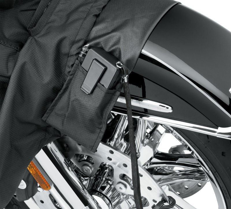 Harley-Davidson Accessories Now available in a compact size to fit Harley-Davidson Street and Sportster models, this cover guards your bike from Mother Nature. Perfect for a bike that is exposed to the elements, this heavy duty cover is manufactured from diamond-pattern 300 Denier fade-resistant polyester and features taped seams for water resistance. - Black, for indoor/outdoor use - Weather-shielded vents in the top of the cover promote air circulation to reduce moisture build-up and minimize corrosion during short or long term storage - Internal heat-resistant panels protect the cover from warm exhaust and an integrated storage pouch permits convenient packing when not in use - Cover skirt features front and rear adjustable drawstrings to cinch the cover around the bike and a convenient belly strap to reduce ballooning in the wind - Features a convenient opening near the front wheel for a security chain or cable - Features reflective piping for added visibility