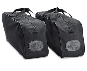 Harley-Davidson Accessories Saddlebag Travel-Paks. Simplify packing and unpacking your motorcycle. Made from water-resistant material, these liners are designed to fit into the Original Equipment saddlebags on Heritage Classic models and Softail Deluxe Rigid Mount Saddlebags (P/N 90201558). Colour: black. The bags feature two-way zippers for easy access and embossed Bar & Shield patches. Fits Heritage FLHC and FLHCS '18-later models with Original Equipment saddlebags.