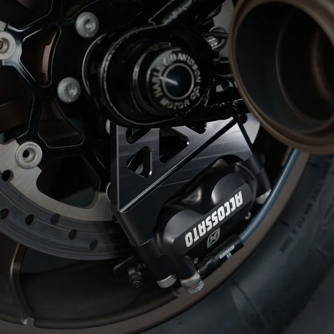 Accossato M8 Softail rear brake caliper bracket. Black