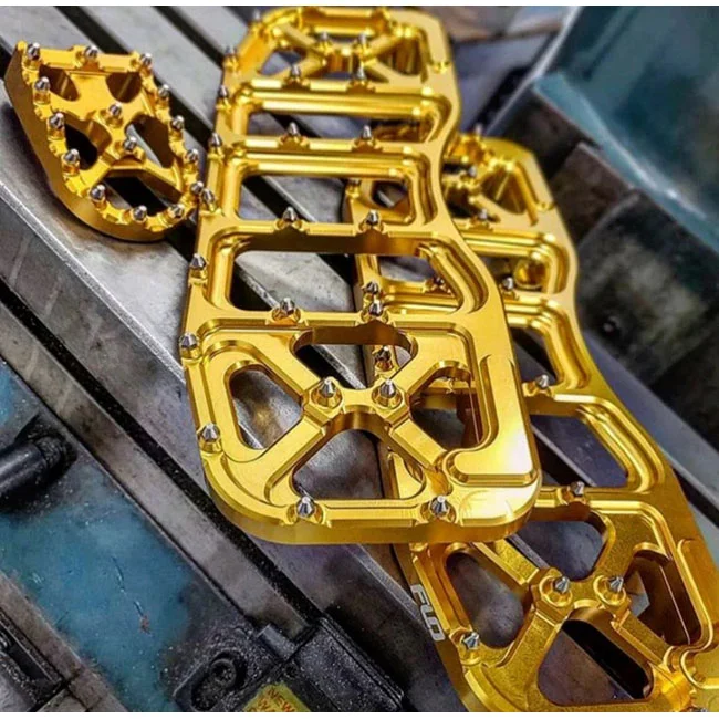 Flo Motorsports V5 Bagger floorboard set. Gold