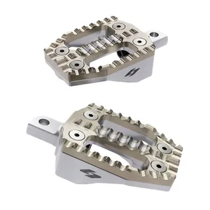 Kraus Kraus, EXO foot peg set. Gold SS top / Machined alu base