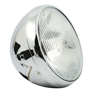 MCS British style 7" H4 headlamp. side mount. Chrome