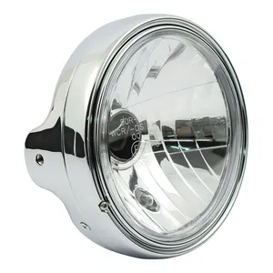 MCS LTD style 7" H4 headlamp. side mount. Clear lens. Chrome