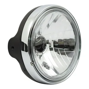MCS LTD style 7" H4 headlamp. side mount. Clear lens. Black