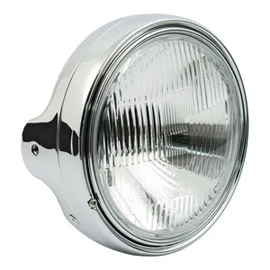 MCS LTD style 7" H4 headlamp. side mount. Chrome