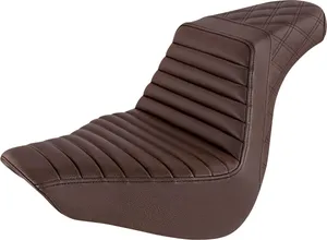 Saddlemen Step-Up Seat<br><ul><li>Ultra-Foam's unique molding process creates an element-resistant, self-skinning process that seals the foam from water and enhances the seat's durability as well as comfort</li><li>Blends rider and passenger comfort with the ergonomics required to keep the rider locked in place and in control of the bike</li><li>Combines a GelCore™ interior with Ultra-Foam that creates a perfect balance of rigidity and user compliance</li><li>All mounting hardware and instructions are included for easy installation</li><li>High lumbar keeps the rider locked into the seat</li><li>Whisper-grain SaddleHyde™ cover</li><li>Made in the USA</li></ul>