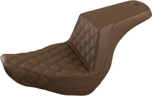 Saddlemen Step-Up Seat<br><ul><li>Ultra-Foam's unique molding process creates an element-resistant, self-skinning process that seals the foam from water and enhances the seat's durability as well as comfort</li><li>Blends rider and passenger comfort with the ergonomics required to keep the rider locked in place and in control of the bike</li><li>Combines a GelCore™ interior with Ultra-Foam that creates a perfect balance of rigidity and user compliance</li><li>All mounting hardware and instructions are included for easy installation</li><li>High lumbar keeps the rider locked into the seat</li><li>Whisper-grain SaddleHyde™ cover</li><li>Made in the USA</li></ul>